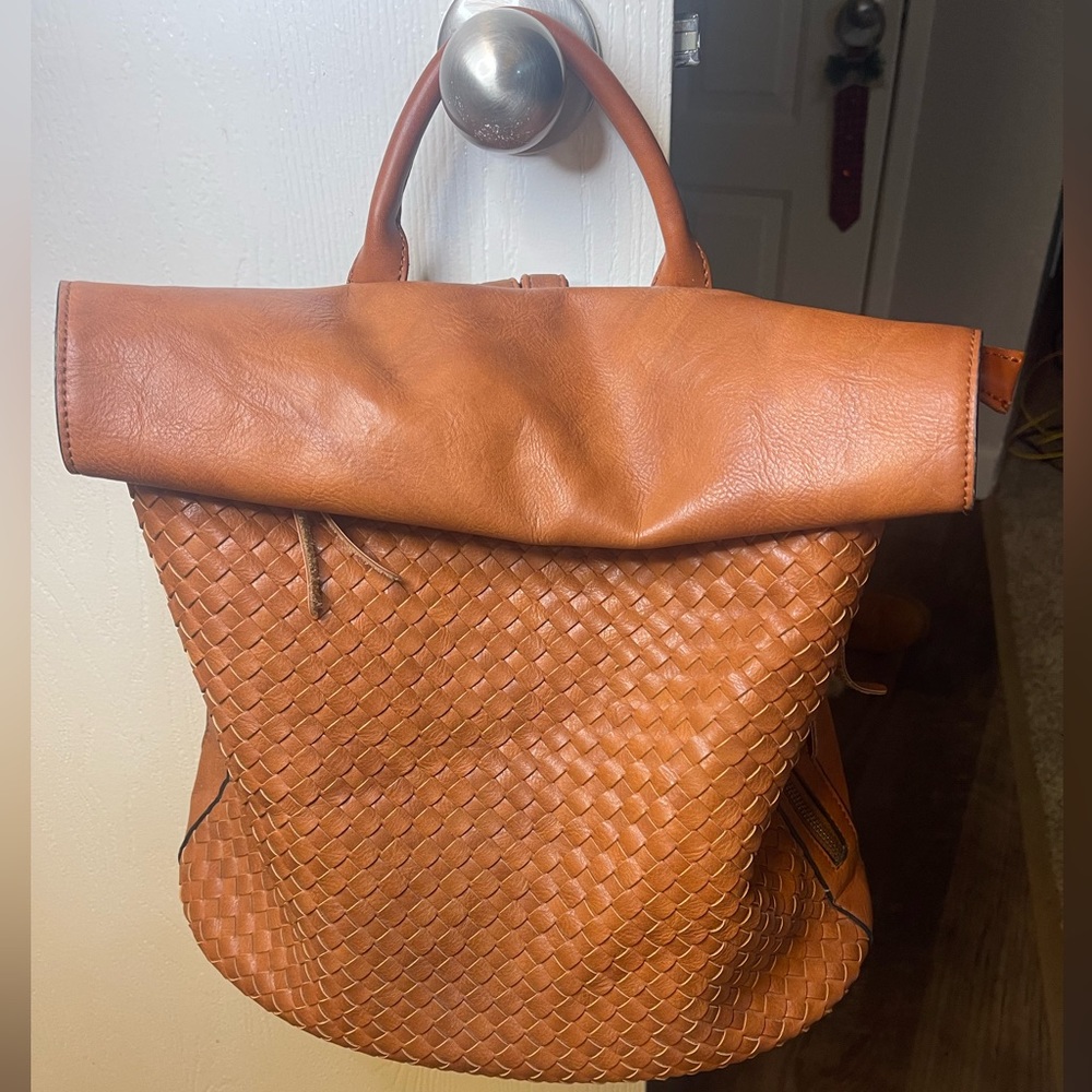 VICI Vegan leather backpack with gold snap closure and zippers. NWOT.